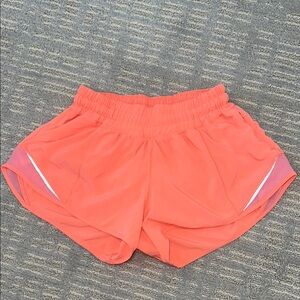 Women's bright light orange lulu Shorts 2.5 inch